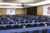 Large meeting room with blue table covers