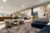 Hotel lobby with two chairs and couch